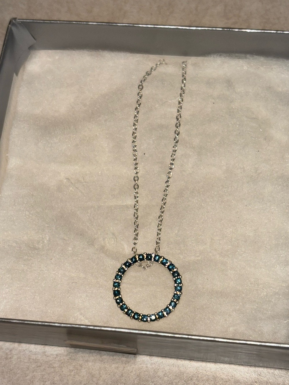 Silver toned necklace with faux sapphire gemstones on silver chain, NWOT